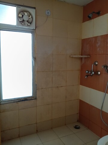 Bathroom in 3 BHK Apartment at Mahagun Mywoods, Sector 16c Greater Noida – for Rent