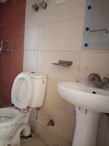 Bathroom in 3 BHK Apartment at Mahagun Mywoods, Sector 16c Greater Noida – for Rent