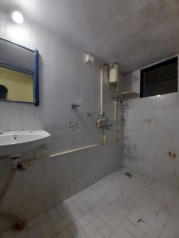 Bathroom in 1 RK Apartment at Amritvan Complex, Aarey Colony – for Rent