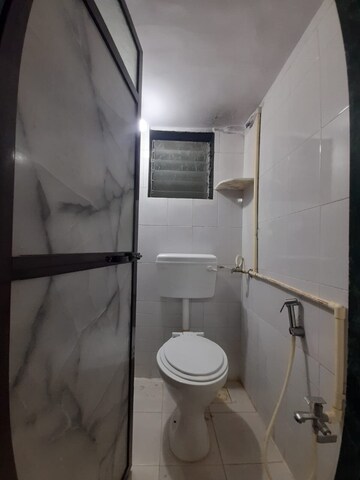 Bathroom in 1 RK Apartment at Amritvan Complex, Aarey Colony – for Rent