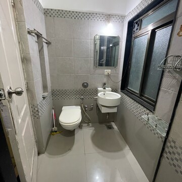 Bathroom in 2 BHK Apartment at Swapnalok Towers, Riddhi Gardens – for Rent