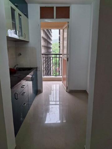 Kitchen in 2 BHK Apartment at MICL Aaradhya Parkwood, Mira Road – for Rent