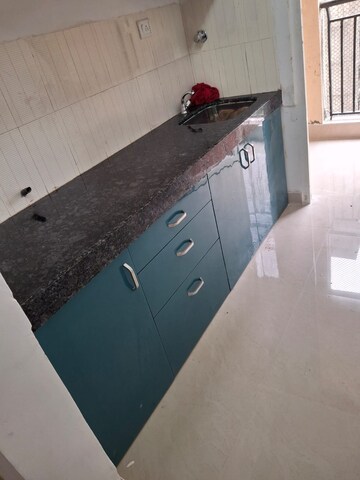 Kitchen in 2 BHK Apartment at MICL Aaradhya Parkwood, Mira Road – for Rent