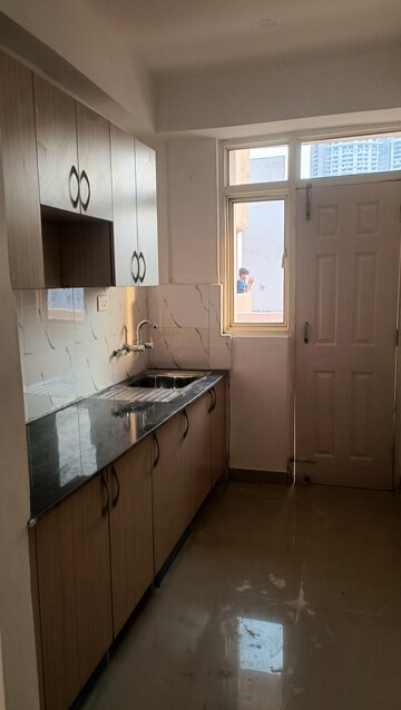 Kitchen in 2 BHK Apartment at Supertech Cape Town, Sector 74 – for Rent