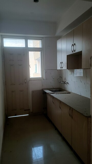 Kitchen in 2 BHK Apartment at Supertech Cape Town, Sector 74 – for Rent