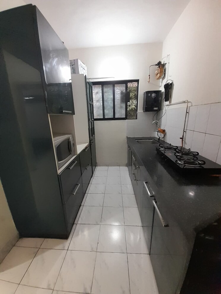 Kitchen, toscana-society 2 Bedroom 800 Sq.Ft. Apartment In Viman Nagar Pune 8701159