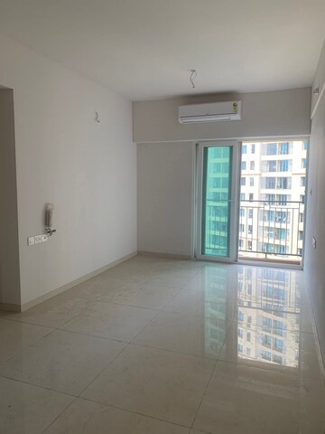 Living Room in 2 BHK Apartment at Rustomjee Urbania Azziano, Majiwada – for Rent