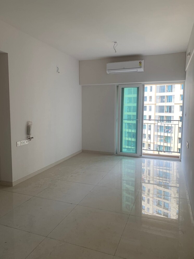 Living Room, rustomjee-urbania-azziano 2 Bedroom 900 Sq.Ft. Apartment In Majiwada Thane 8701291