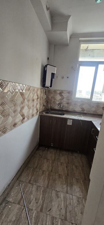 Kitchen in 2 BHK Apartment at Amrapali Riverview, Amrapali Leisure Valley – for Rent