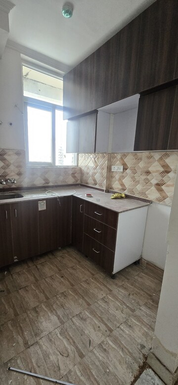 Kitchen in 2 BHK Apartment at Amrapali Riverview, Amrapali Leisure Valley – for Rent
