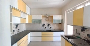 Kitchen in 3 BHK Apartment at Great Value Sharanam, Sector 107 – for Sale