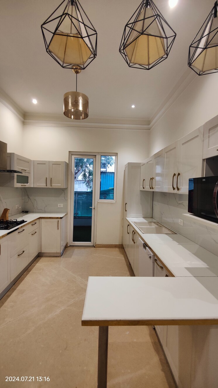 Kitchen, t-and-t-eutopia-phase-1 4 Bedroom 2295 Sq.Ft. Apartment In Siddharth Vihar Ghaziabad 8701610