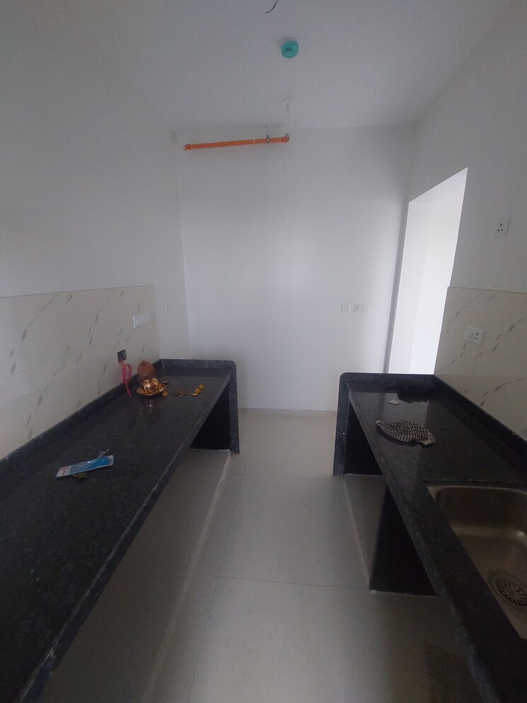 Kitchen, goel-ganga-legend 2 Bedroom 900 Sq.Ft. Apartment In Bavdhan Pune 8701619