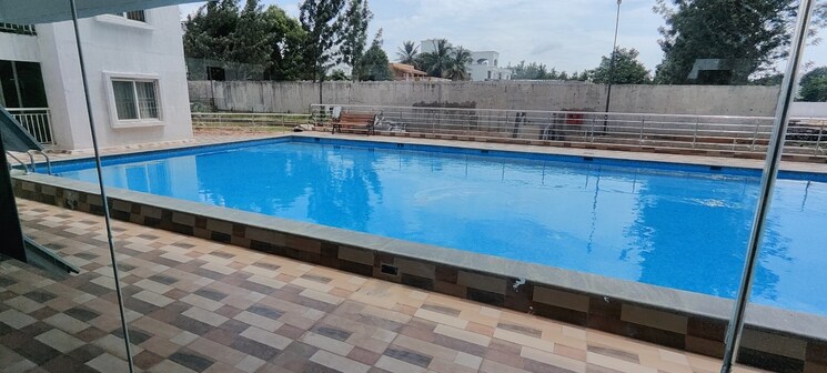 Swimming Pool, sai-kalyan-ultima 2 Bedroom 1100 Sq.Ft. Apartment In Thanisandra Bangalore 8701666