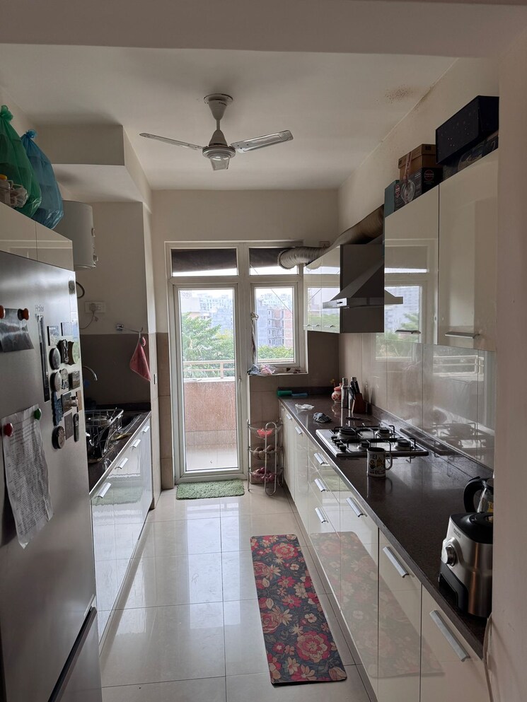 Kitchen, emaar-palm-gardens 3 Bedroom 1900 Sq.Ft. Apartment In Sector 83 Gurgaon 8701677