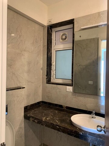Bathroom in 2 BHK Apartment at Ruparel Nova, Parel – for Rent