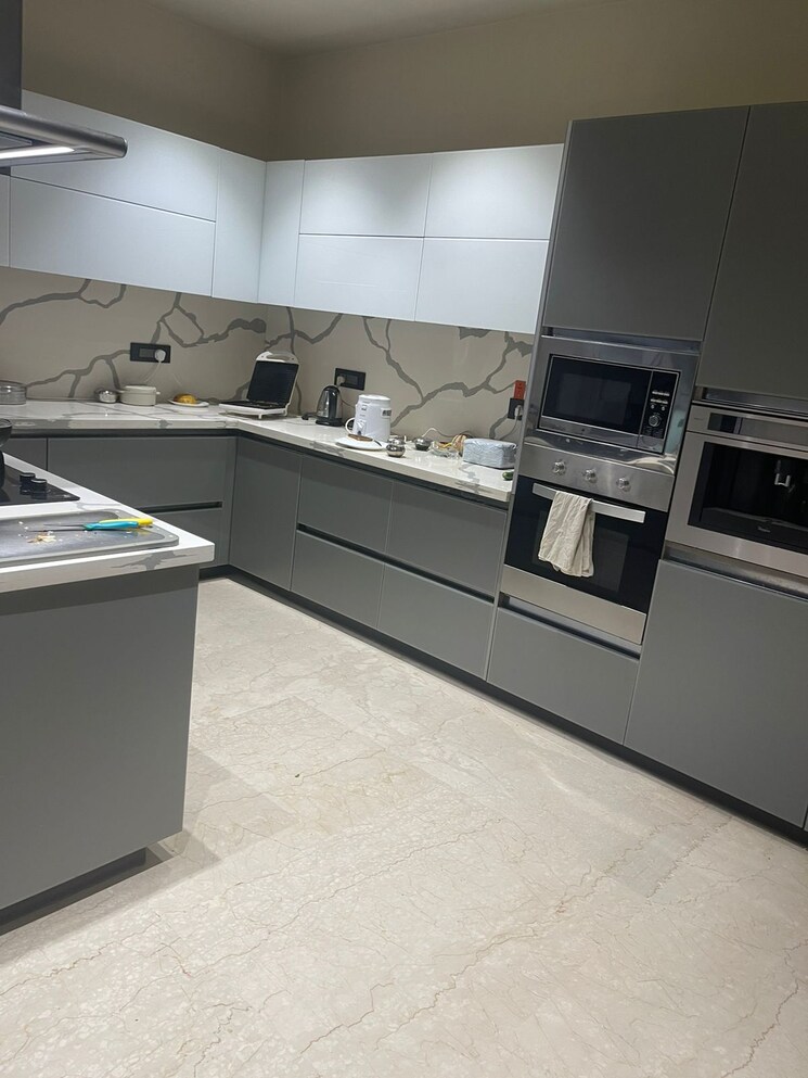 Kitchen, unitech-uniworld-resorts-the-residences 5 Bedroom 4500 Sq.Ft. Builder Floor In Sector 33 Gurgaon 8701867