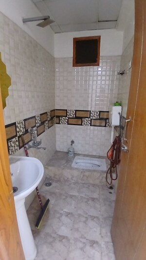 Bathroom in 3 BHK Apartment at Zakir Nagar – for Sale