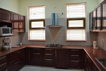 Kitchen in 4 BHK Apartment at DLF The Summit, Dlf Phase V – for Sale