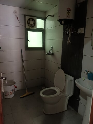 Bathroom in 2 BHK Apartment at Gulshan Bellina, Sector 16 Greater Noida – for Rent