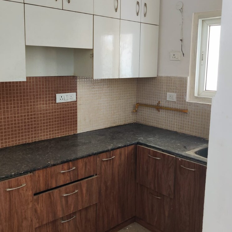 Kitchen, antriksh-golf-city 2 Bedroom 1050 Sq.Ft. Apartment In Sector 150 Noida 8702139