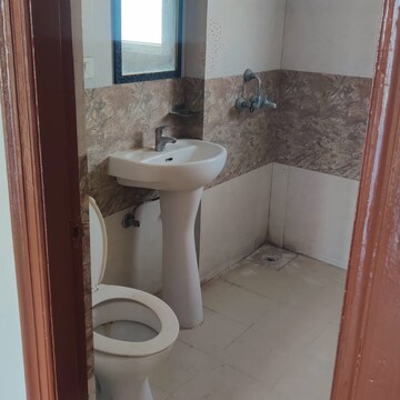 Bathroom in 2.5 BHK Apartment at Antriksh Golf City, Sector 150 – for Rent