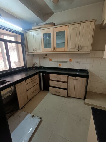Kitchen in 2 BHK Apartment at Sai Baba Enclave, Goregaon West – for Rent