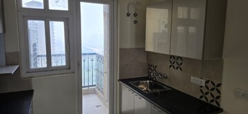 Kitchen in 2 BHK Apartment at Shree Vardhman Green Court, Sector 90 – for Rent