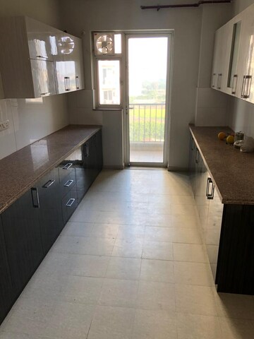 Kitchen in 4 BHK Apartment at DLF New Town Heights I, Sector 90 – for Rent