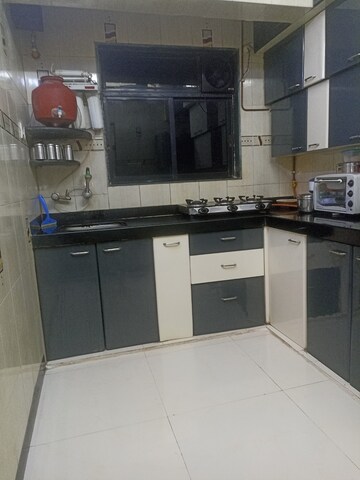 Kitchen in 2 BHK Apartment at Sanpada Sector 1 – for Sale