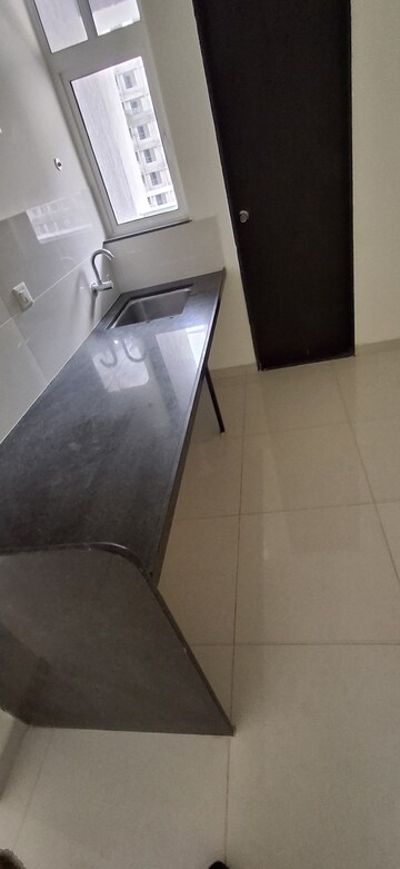 Kitchen in 1 BHK Apartment at Kolte Patil R10, Hinjewadi – for Rent