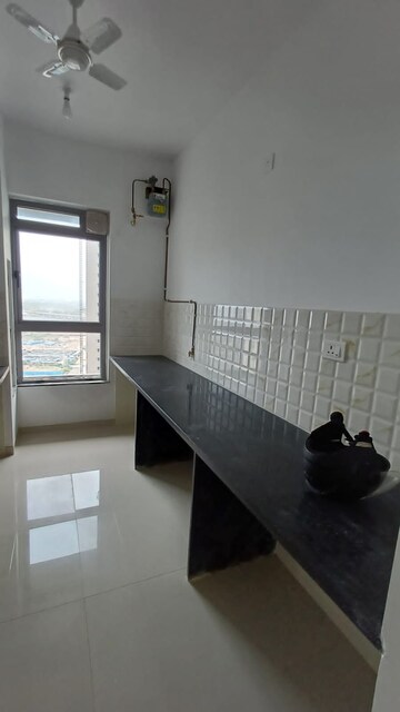 Kitchen in 2 BHK Apartment at Kalpataru Immensa, Kolshet Road – for Rent