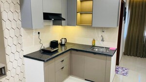 Kitchen in Studio Apartment at Okay Plus Solitaire Suites, Ramnagariya – for Sale