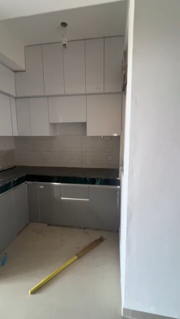 Kitchen in 1 BHK Apartment at Shree Vardhman Green Court, Sector 90 – for Rent