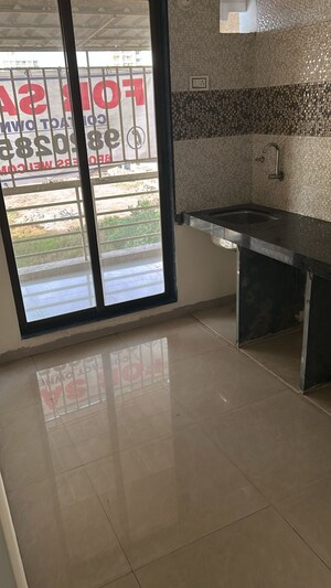 Kitchen in 1 BHK Apartment at Villa Signature Residency, Dronagiri – for Sale