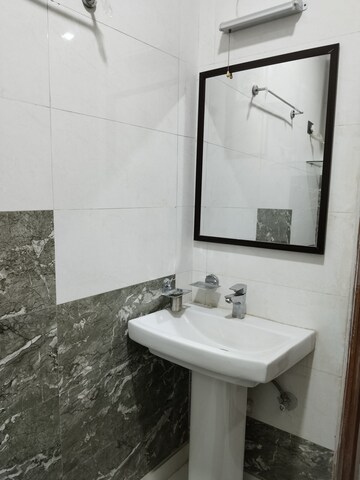Bathroom in 3 BHK Apartment at Panchsheel Vihar – for Rent
