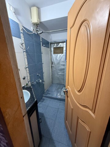 Attached Bathroom in 2 BHK Apartment at STG Marigold Siddheshwar Garden, Dhokali – for Rent