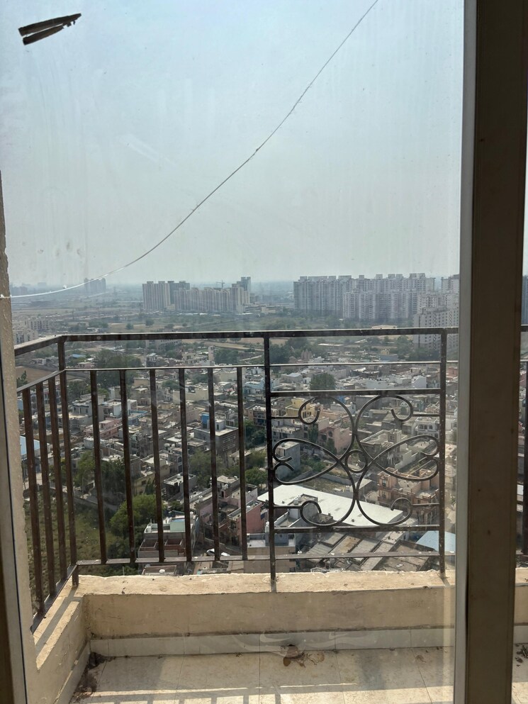 Balcony, signature-global-the-millennia 2 Bedroom 1150 Sq.Ft. Apartment In Sector 37d Gurgaon 8704343