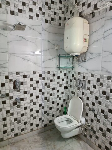 Bathroom in 1 RK Apartment at Khirki Extension – for Rent