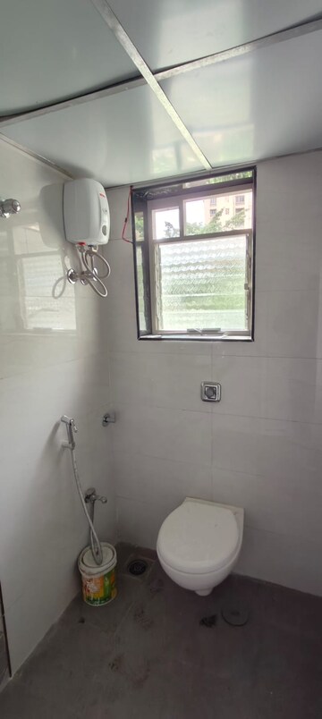 Bathroom in 2 BHK Apartment at Royal Palms, Goregaon East – for Rent