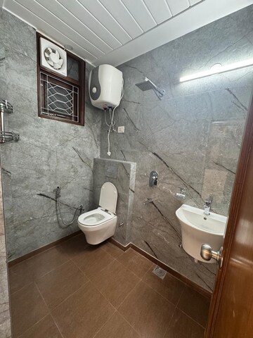 Bathroom in 3 BHK Apartment at Khirki Extension – for Sale