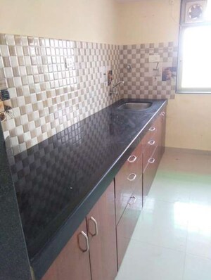 Kitchen in 2 BHK Apartment at Samrin Imperial Heights Apartment, Kolshet – for Sale