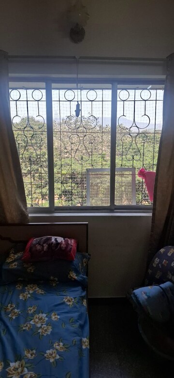 Bedroom in 1 BHK Apartment at HDIL Dheeraj Upvan 1, Borivali East – for Sale
