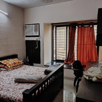Bedroom in 2 BHK Apartment at Swapnalok Towers, Riddhi Gardens – for Rent