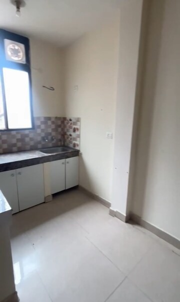Kitchen in 1 BHK Apartment at DLF City Phase III, Sector 24 – for Rent