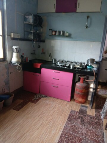 Kitchen in 1 BHK Apartment at Hanuman Road – for Sale