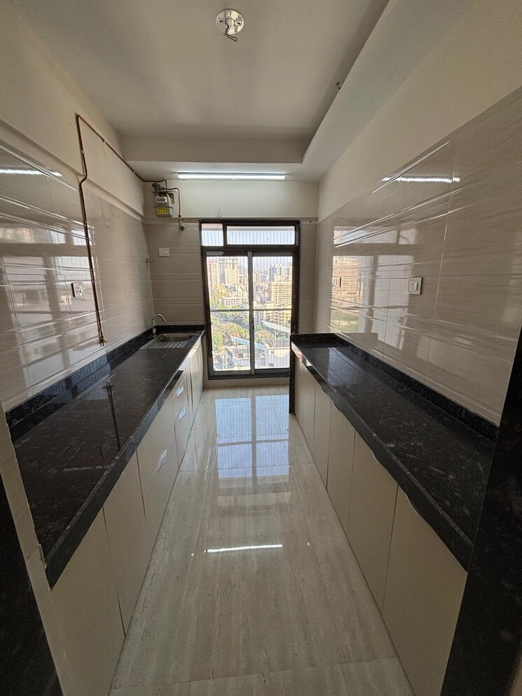 Kitchen, je-and-vee-om-trimurti 3 Bedroom 941 Sq.Ft. Apartment In Malad East Mumbai 8705411