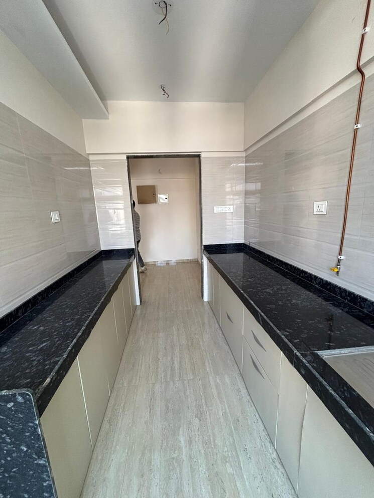 Kitchen, je-and-vee-om-trimurti 3 Bedroom 941 Sq.Ft. Apartment In Malad East Mumbai 8705411