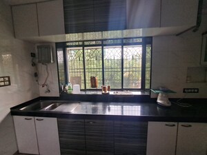 Kitchen in 1 BHK Apartment at Rashmi Complex Teen Hath Naka, Dharamveer Nagar – for Sale