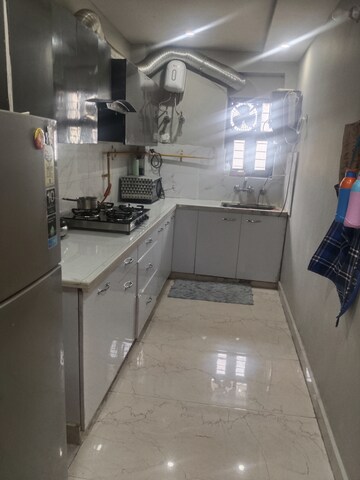 Kitchen in 2 BHK Apartment at Saya Gold Avenue, Vaibhav Khand – for Rent